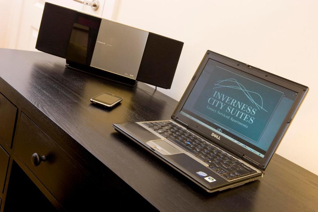 Inverness City Suites Quarto foto