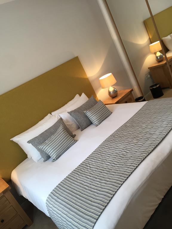 Inverness City Suites Quarto foto